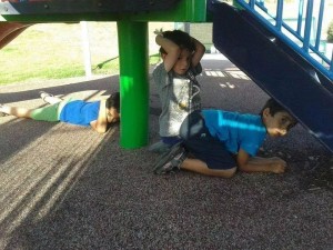 Children seek shelter during a missile attack.